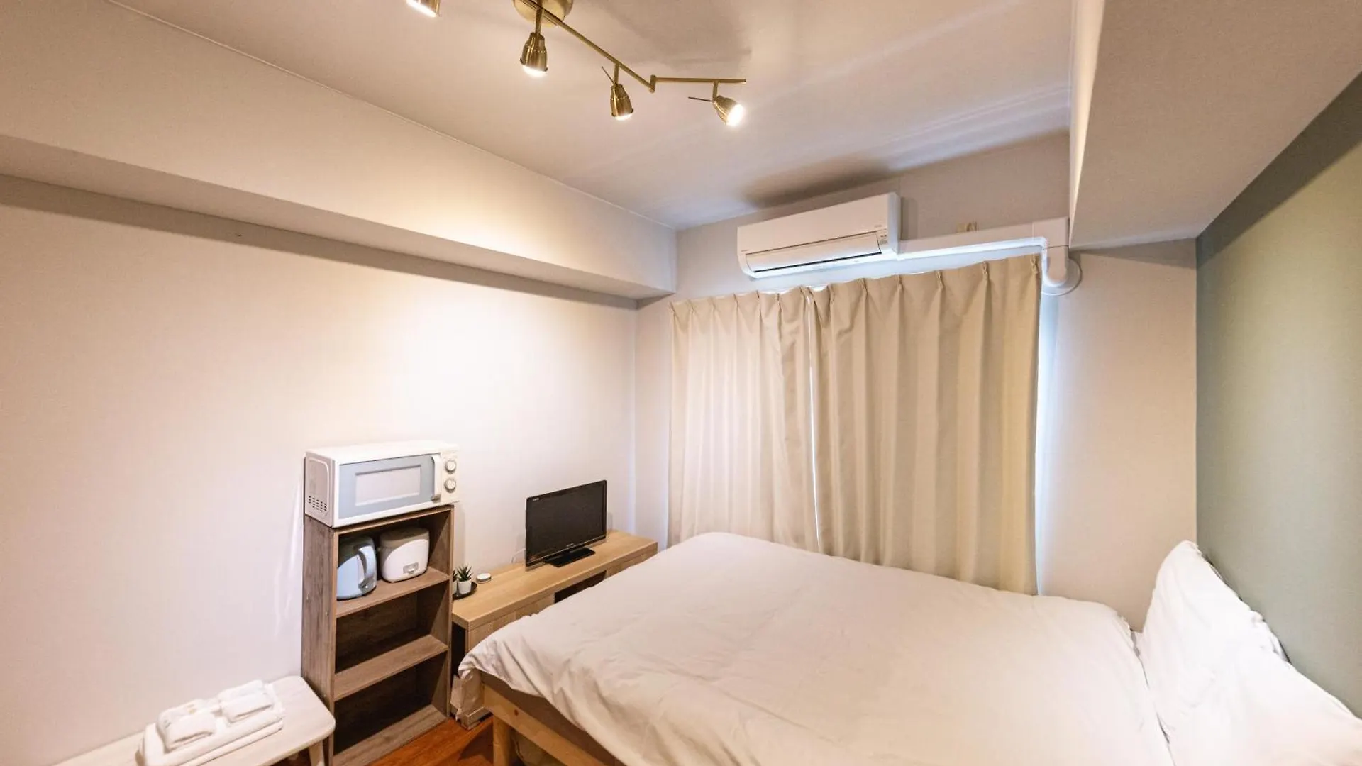 Apartamento 702 道頓堀側のお部屋 中心地へのアクセス抜群 ダブルベッド1台 お布団1枚 Osaka 0*,  Japón